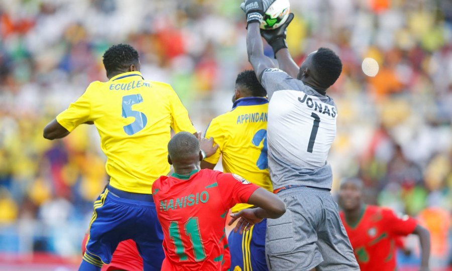 Football Soccer - African Cup of Nations - Gabon v Guinea-Bissau - Stade de l'Amitie - Libreville, Gabon - 14/1/17 - Gabon's Bruno Ecuele Manga and Aaron Appindangoye in action with Guinea-Bissau's keeper Jonas Mendes. REUTERS/Mike Hutchings