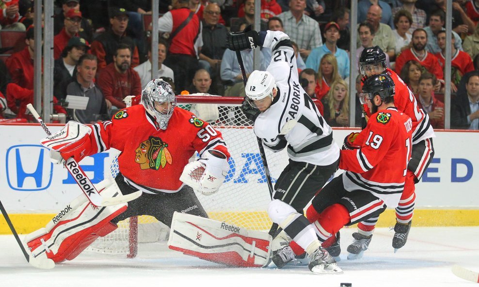 Marian Gaborik (12), Jonathan Toews (19) te vratar Corey Crawford (50)