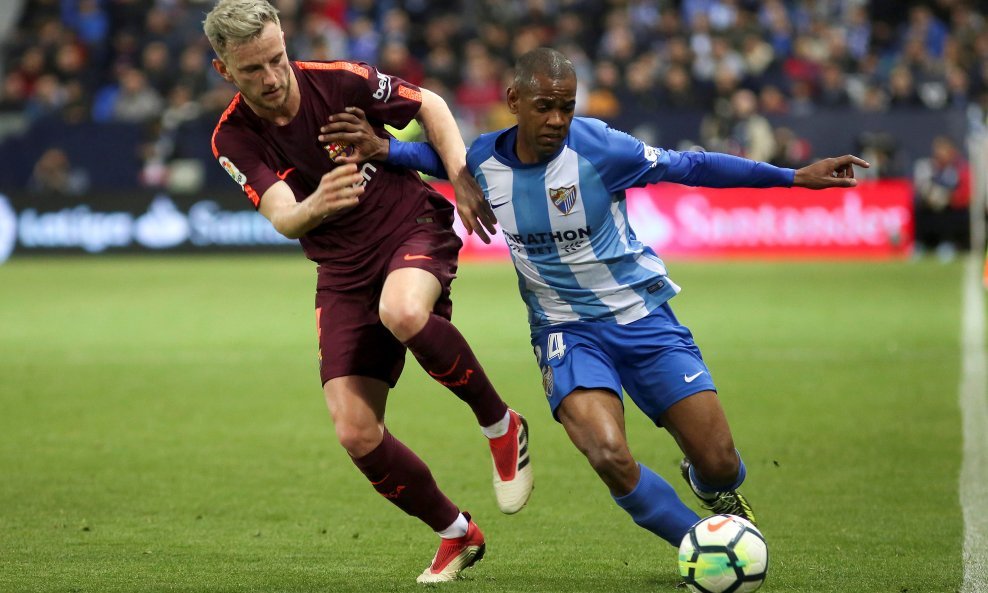 Ivan Rakitić (Barcelona) i Diego Rolan (Malaga)