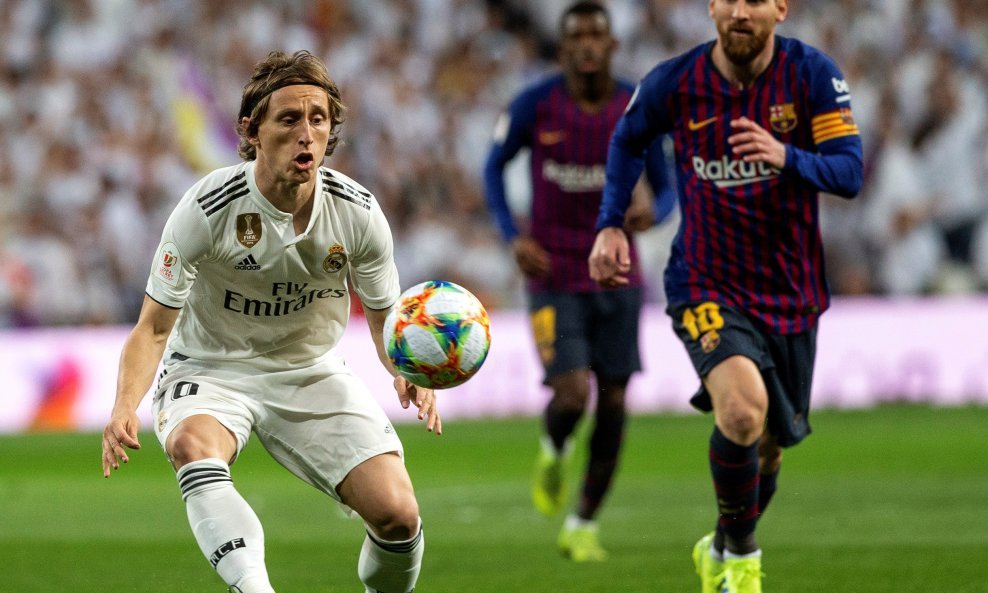 Luka Modrić i Leo Messi