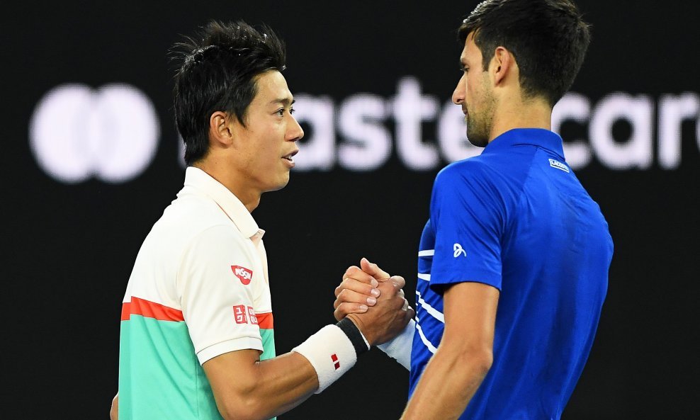 Kei Nishikori (l) i Novak Đoković