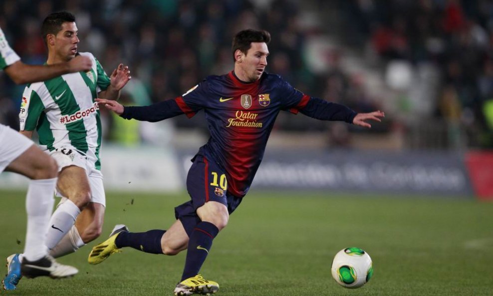 Lionel Messi i Carlos Caballero (Cordoba)