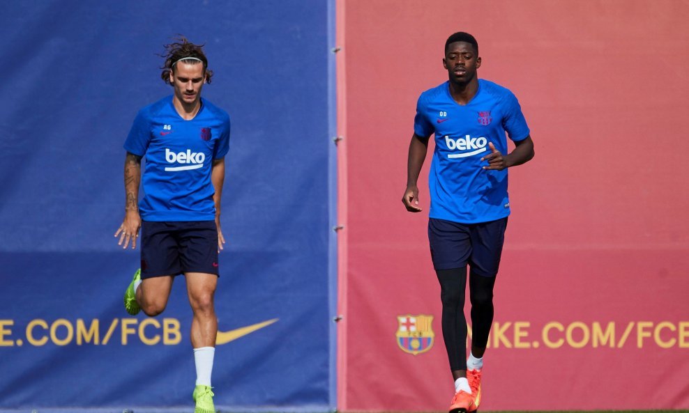 Antoine Griezmann (L) i  Ousmane Dembele