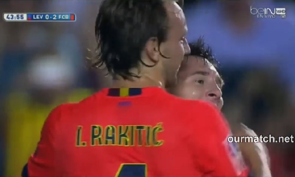 Rakitić slavi s Messijem