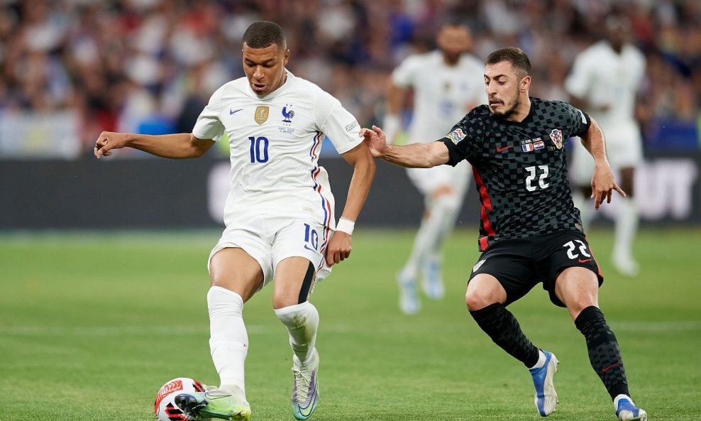 Josip Juranović i Kylian Mbappé