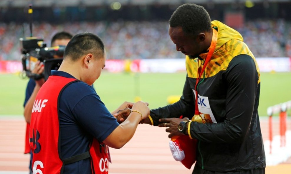 Song Tao i Usain Bolt