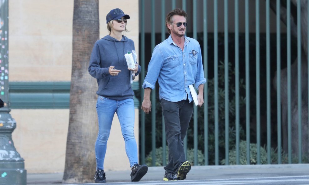 *EXCLUSIVE* Los Angeles, CA - Sean Penn and Leila George cover a lot of ground on Thursday. The two fuel up in Malibu before heading near Little Ethiopia for some grub. Penn and George end up not eating after scoping out the place and decided to head over