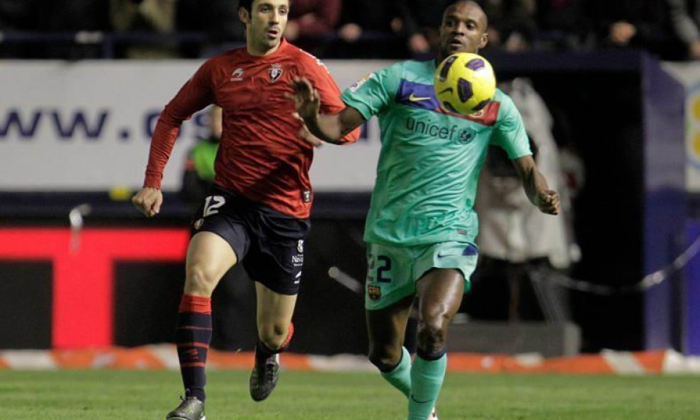 Juanfran Torres i Eric Abidal (desno)