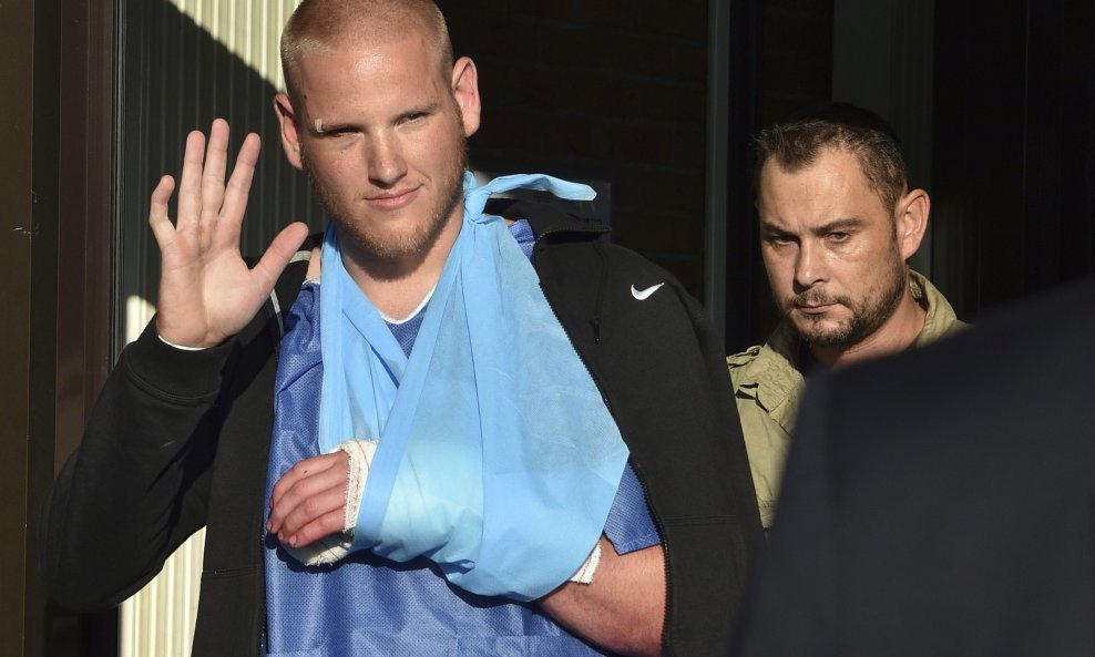 U.S. serviceman Spencer Stone waves as he departs the Clinique Lille Sud in Lesquin, France, in this file photo taken August 22, 2015. Stone, one of the three Americans who thwarted an August train attack in France, was stabbed several times during a figh