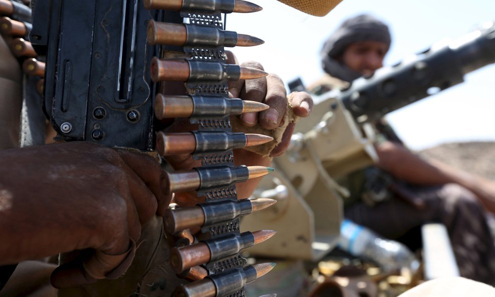 Soldiers loyal to Yemen's government sit on an armoured personnel carrier in the frontline province of Marib, October 4, 2015. REUTERS/Stringer