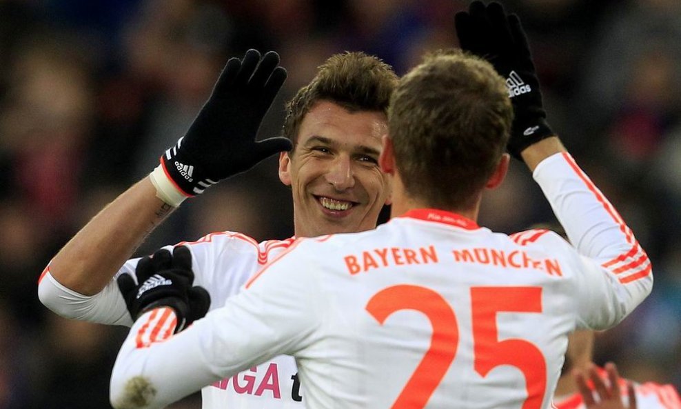 Mario Mandžukić (L) i Thomas Müller