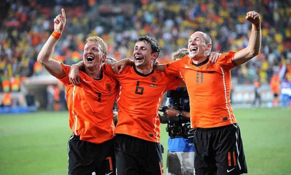 Dirk Kuyt, Mark van Bommell i Arjen Robben