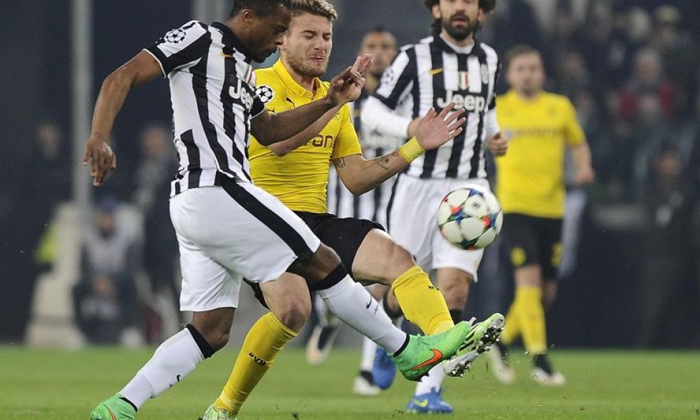 Juventus - Borussia Dortmund,  Patrice Evra i Ciro Immobile