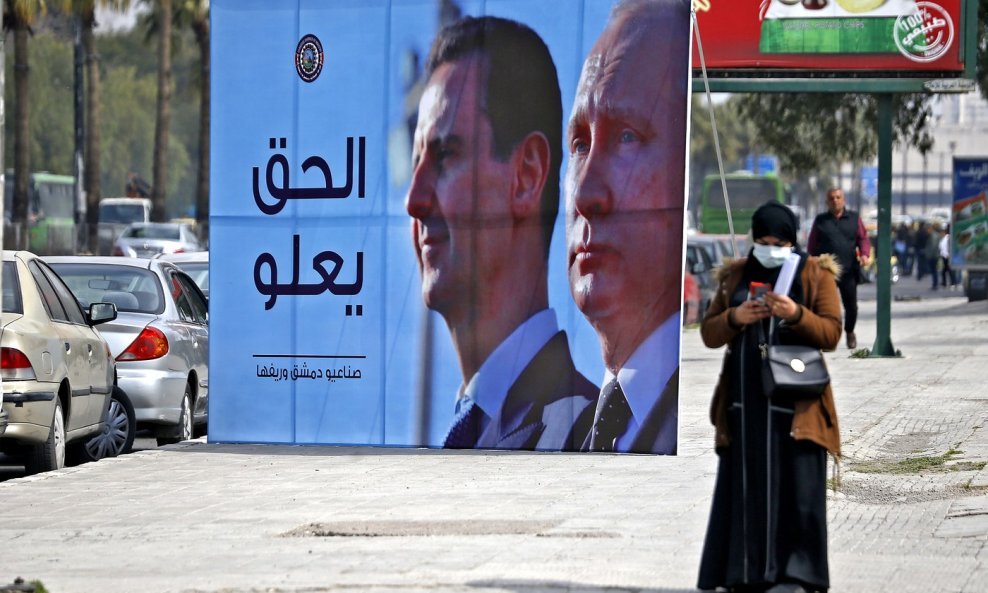 Bašar Asad i Vladimir Putin na plakatu iz 2022. godine