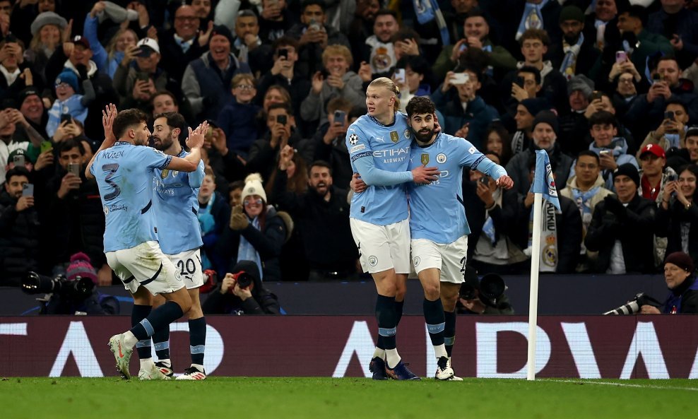 Erling Haaland slavi s Joškom Gvardiolom