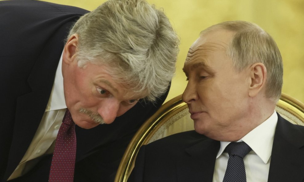 Dmitri Peskov i Vladimir Putin