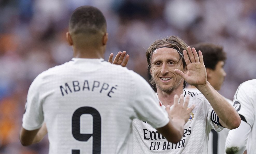 Luka Modrić i Kylian Mbappe