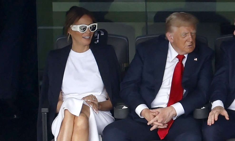 Donald Trump i Melania Trump u društvu Giannija Infantina i supruge