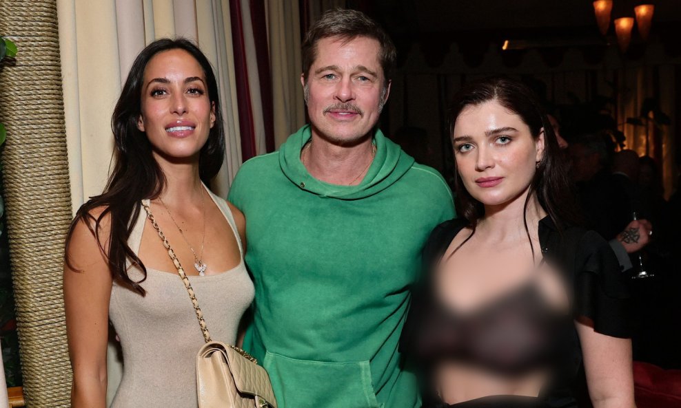 Ines de Ramon, Brad Pitt, and Eve Hewson