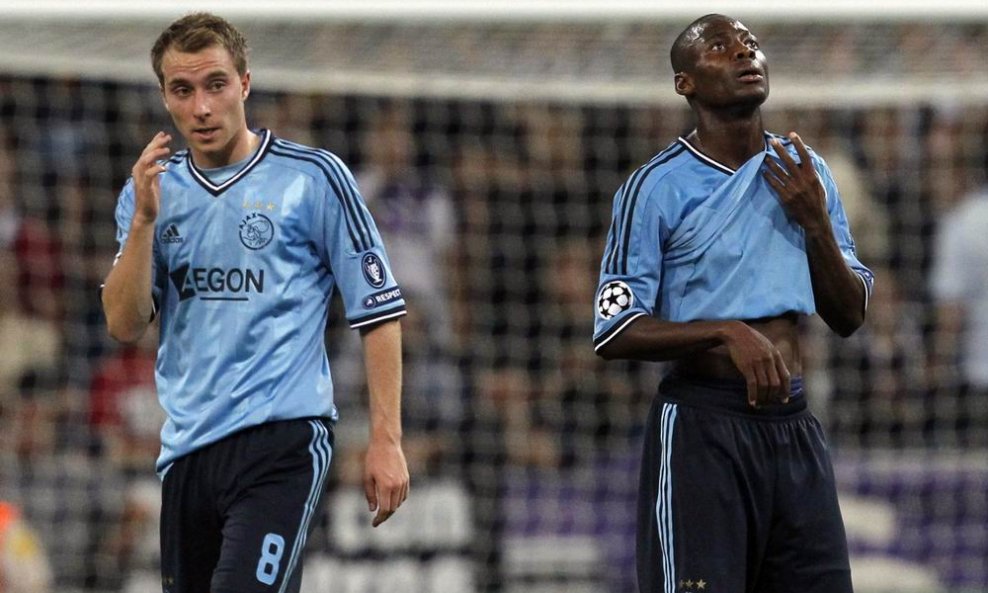 Christian Eriksen (L) i Eyong Enoh
