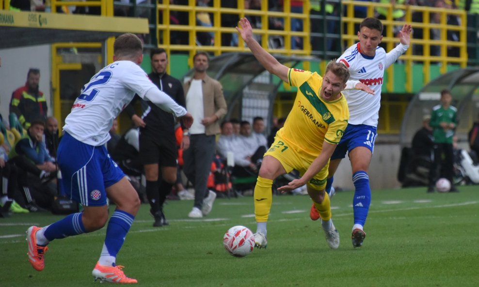 Ville Koski (u žutom dresu) vs. Michele Šego