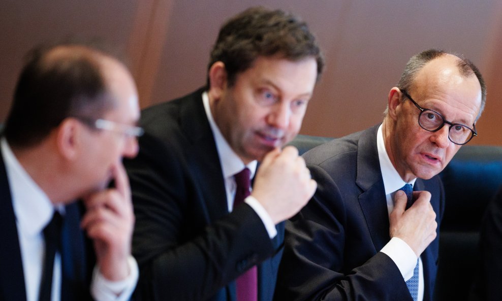 Lars Klingbeil (u sredini) i Friedrich Merz (desno)