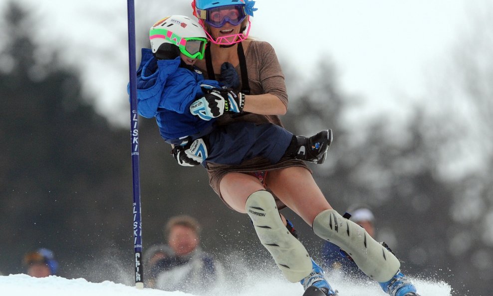 Sarah Schleper sa sinom na stazi 2011.