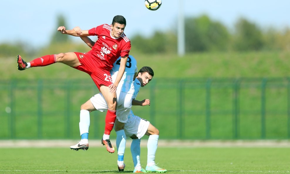 Luka Sedlaček (u crvenom dresu) dok je igrao za Goricu