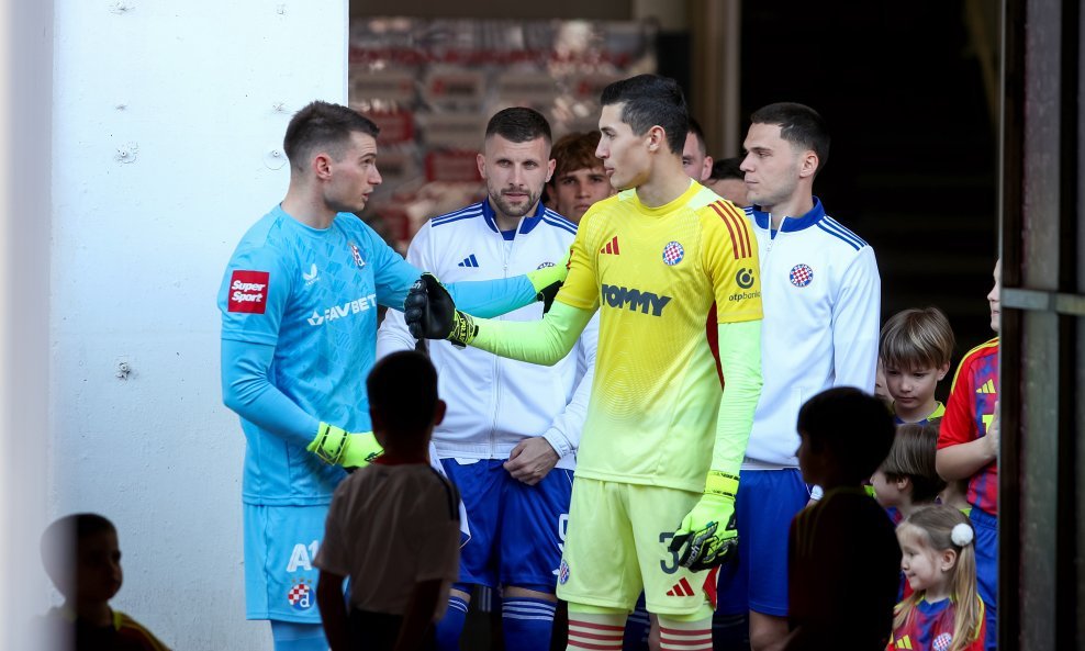 Dominik Livaković i Toni Silić