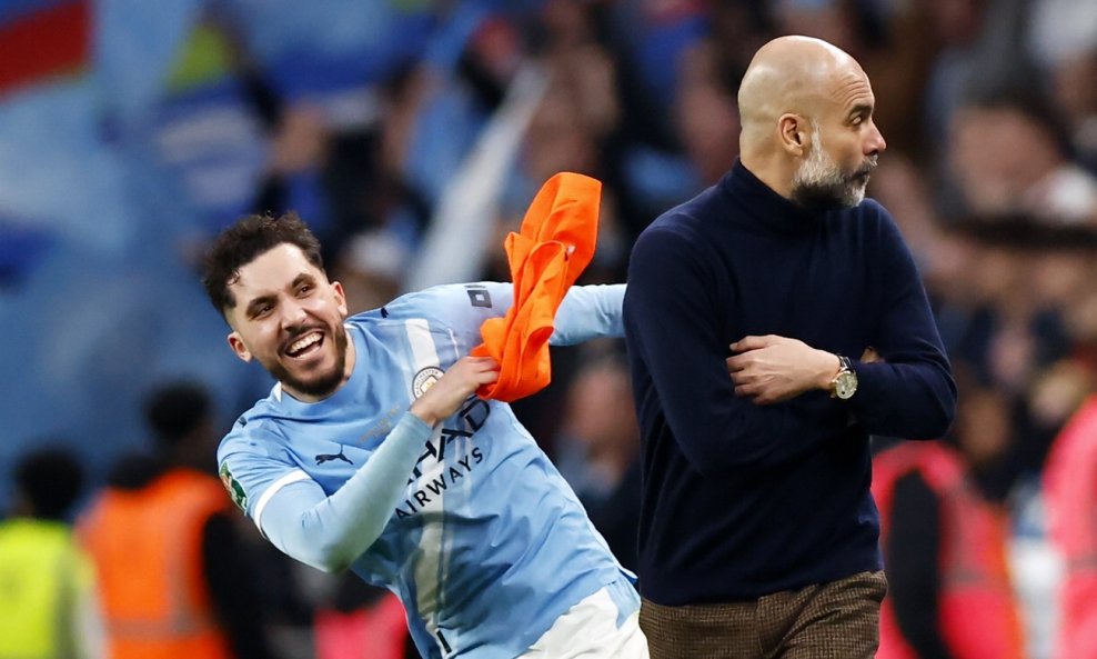 Pep Guardiola i  Rayan Cherki