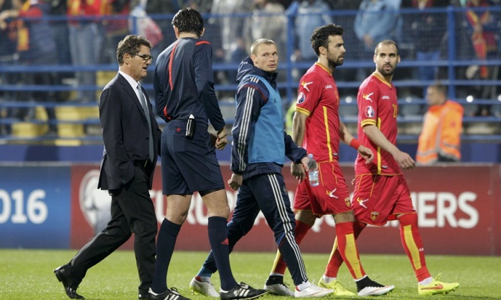 Sudac Deniz Aytekin i izbornik Rusije Fabio Capello