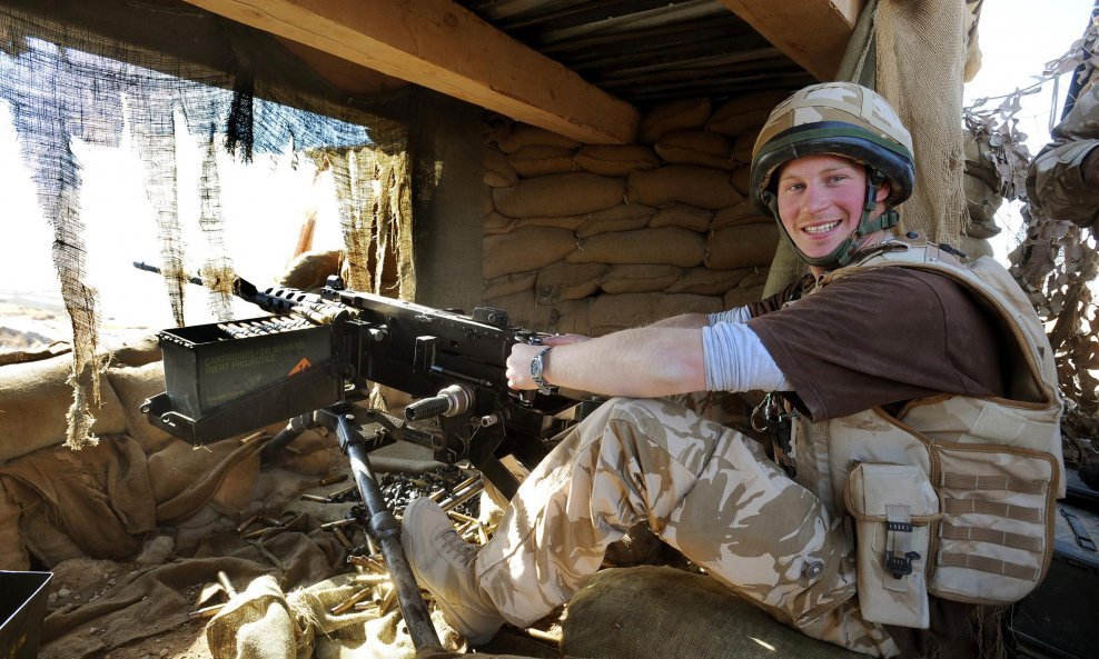 Britain's Prince Harry mans a 50 calibre machine gun on the observation post at JTAC Hill, close to FOB Delhi (forward operating base), in Helmand province, southern Afghanistan in this January 2, 2008 file photo. Prince Harry announced on March 17, 2015 