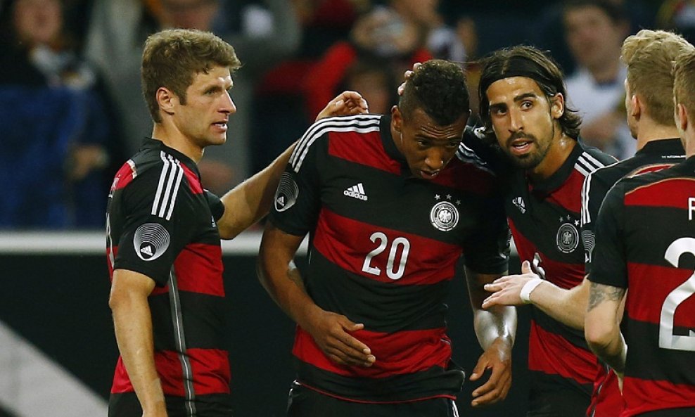 Thomas Müller (L), Jerome Boateng (u sredini) i Sami Khedira