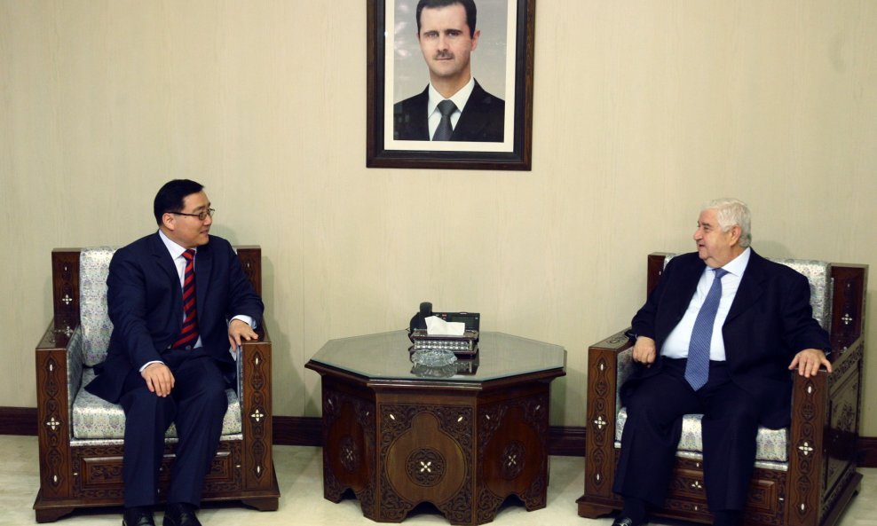 Li Huaxin i Valid Mualem