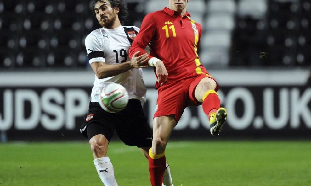 Gareth Bale (d) i Veli Kavlak