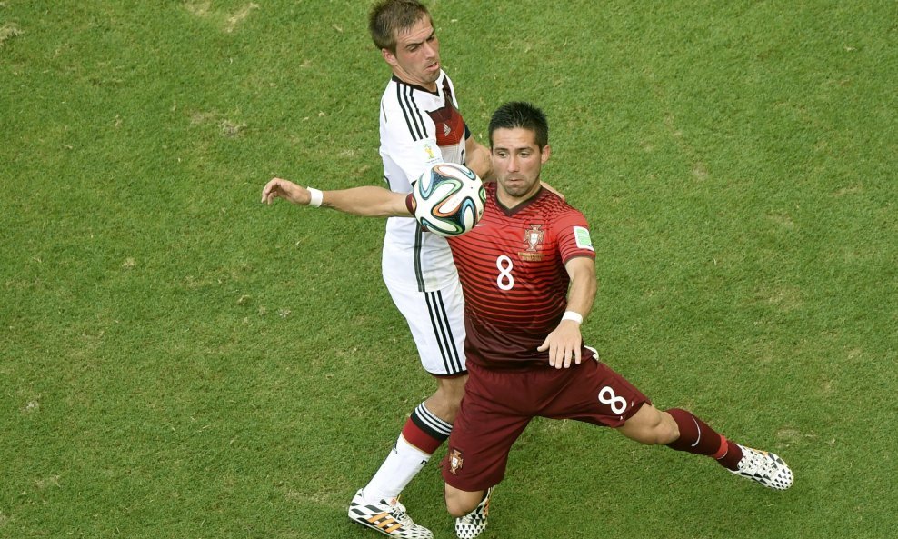 Philipp Lahm i  Joao Moutinho