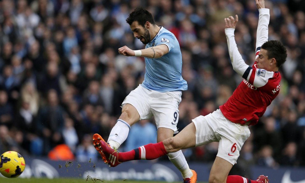 Alvaro Negredo Manchester City Laurent Koscielny Arsenal