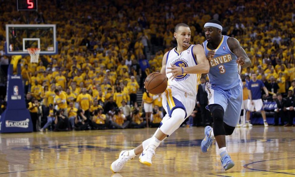 Stephen Curry (L) i Ty Lawson