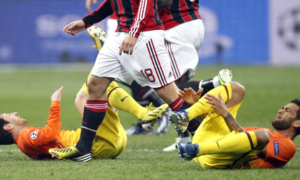 Zvijezde Barcelone Lionel Messi i Daniel Alves  na utakmici protiv Milana