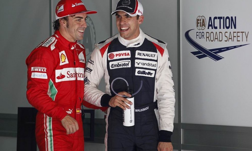 Fernando Alonso (L) i Pastor Maldonado