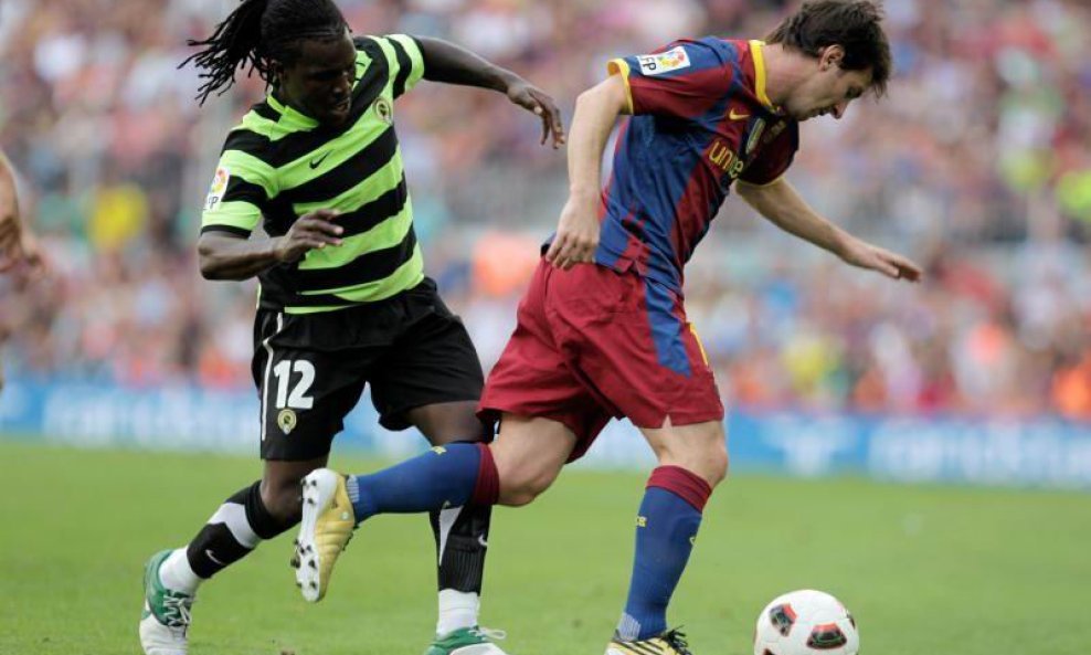 Lionel Messi i Royston Drenthe