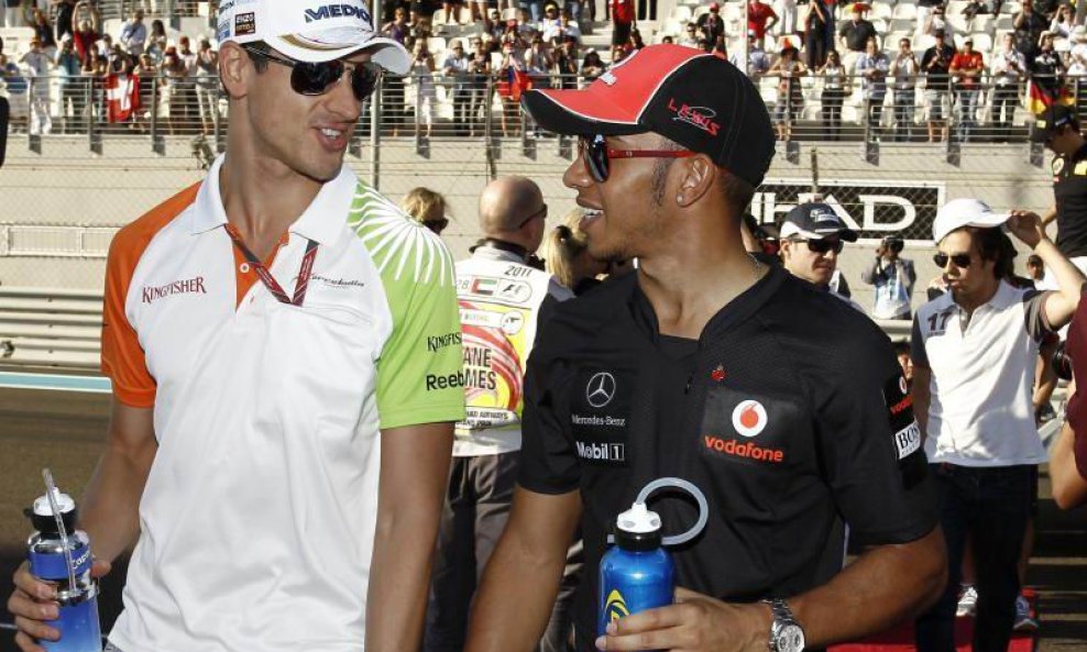 Adrian Sutil i Lewis Hamilton