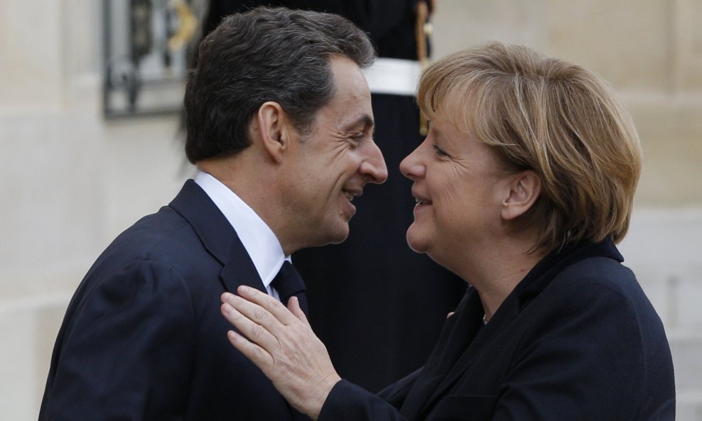 Angela Merkel i Nicolas Sarkozy poljubac