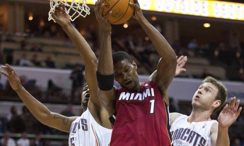 Chris Bosh, Dominic McGuire i Matt Carroll