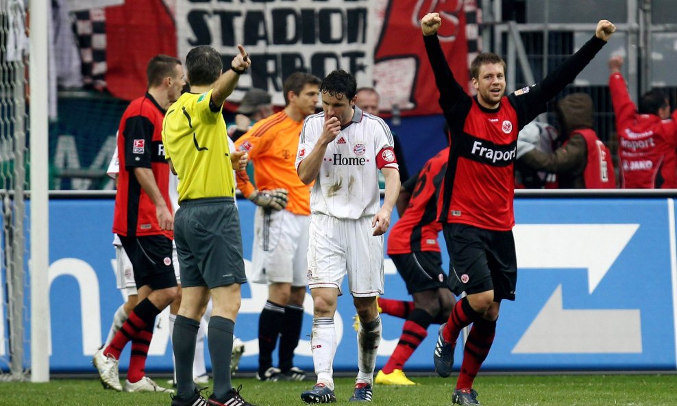 Frankfurt Eintracht - Bayern (Mark van Bommel; Marco Russ )