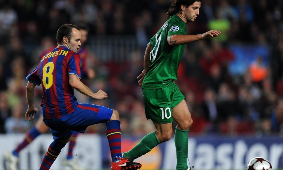 Andres Iniesta; Alejandro Dominguez (Barcelona - Rubin)