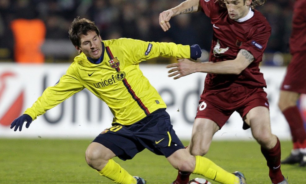 Lionel Messi i Roman Šaronov