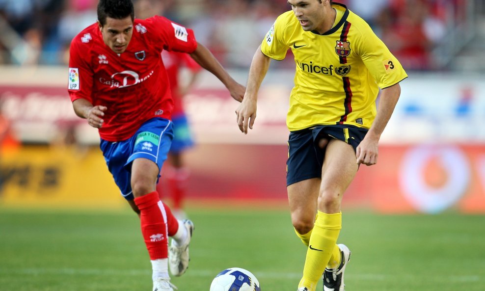 Mario Martinez i Andres Iniesta