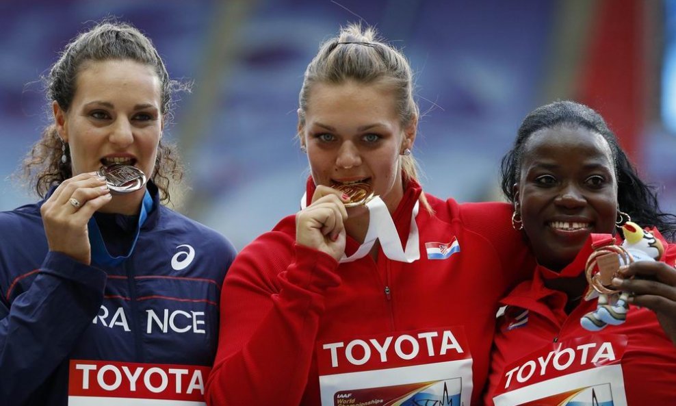 Svjetska prvakinja Sandra Perković, srebrna Melina Robert-Michon i bronćana Yarelys Barrios