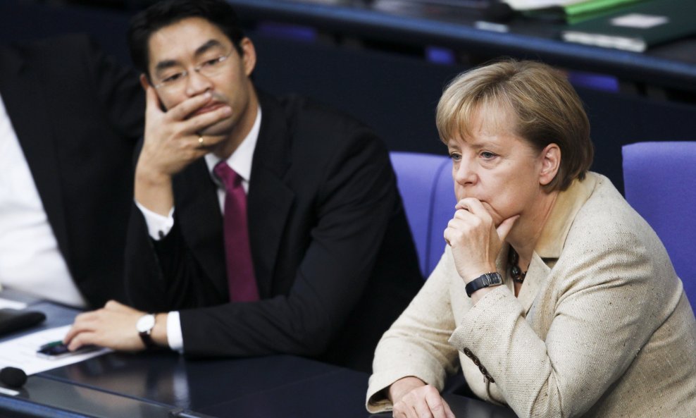 Bundestag - Philipp Roesler i Angela Merkel